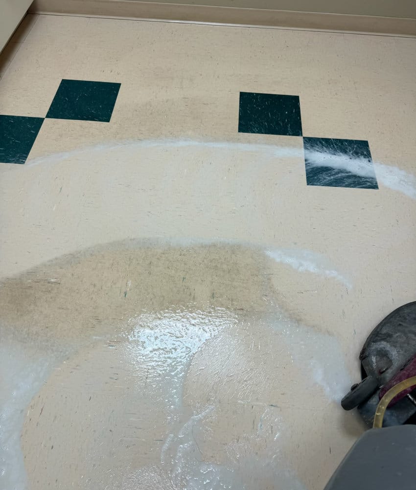 cleaning vinyl floor by stripping and waxing